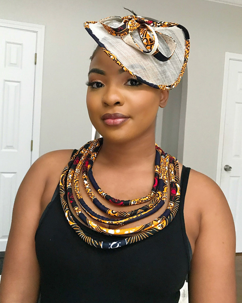 Bessa African Print Fascinator Hat - Navy blue / Orange