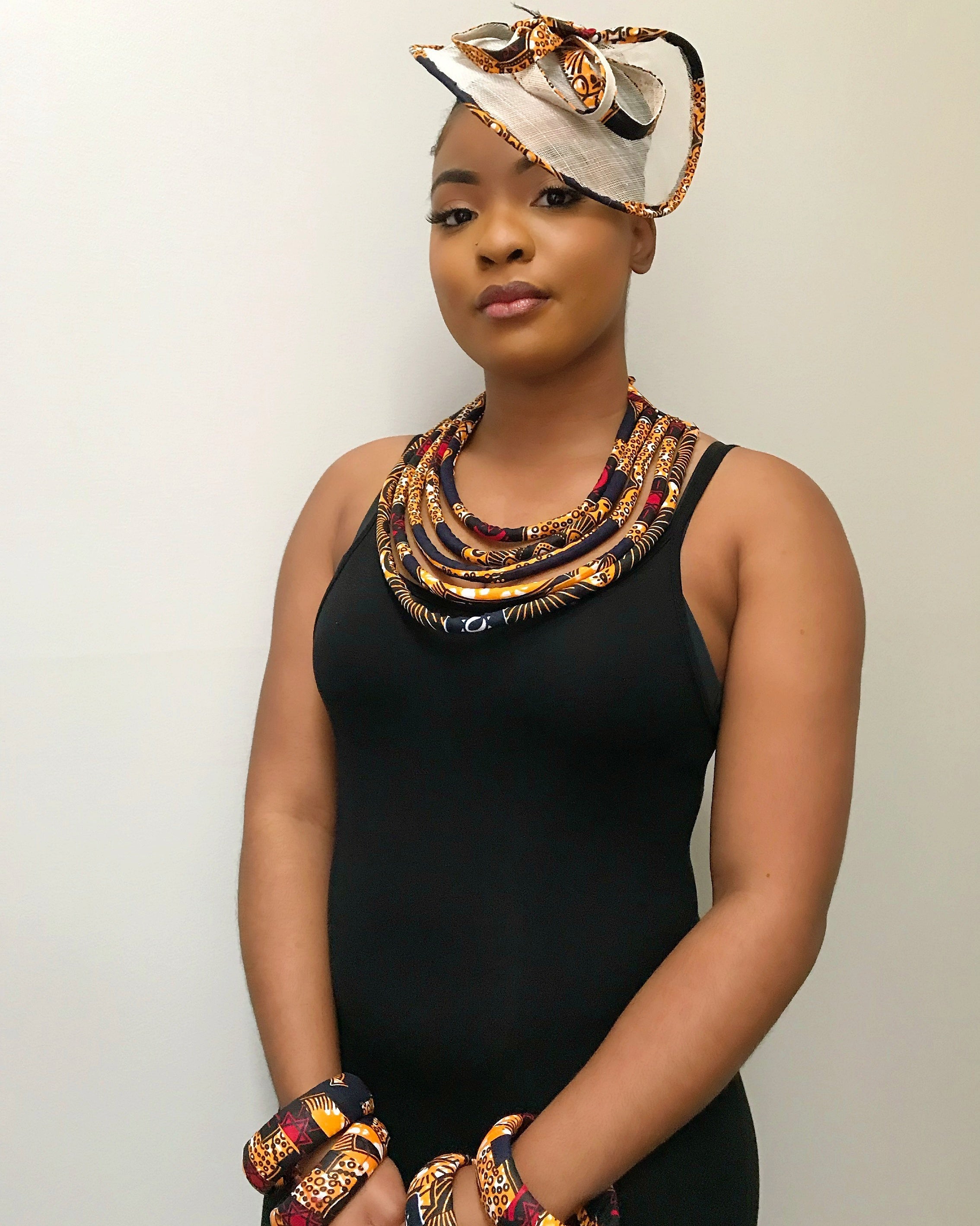 Bessa African Print Fascinator Hat - Navy blue / Orange